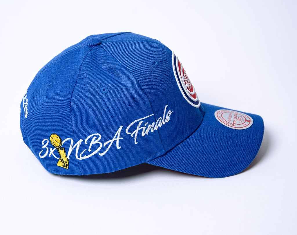 MENS MITCHELL & NESS NBA CHAMP WRAP PRO SNAPBACK HWC PISTONS - BLUE