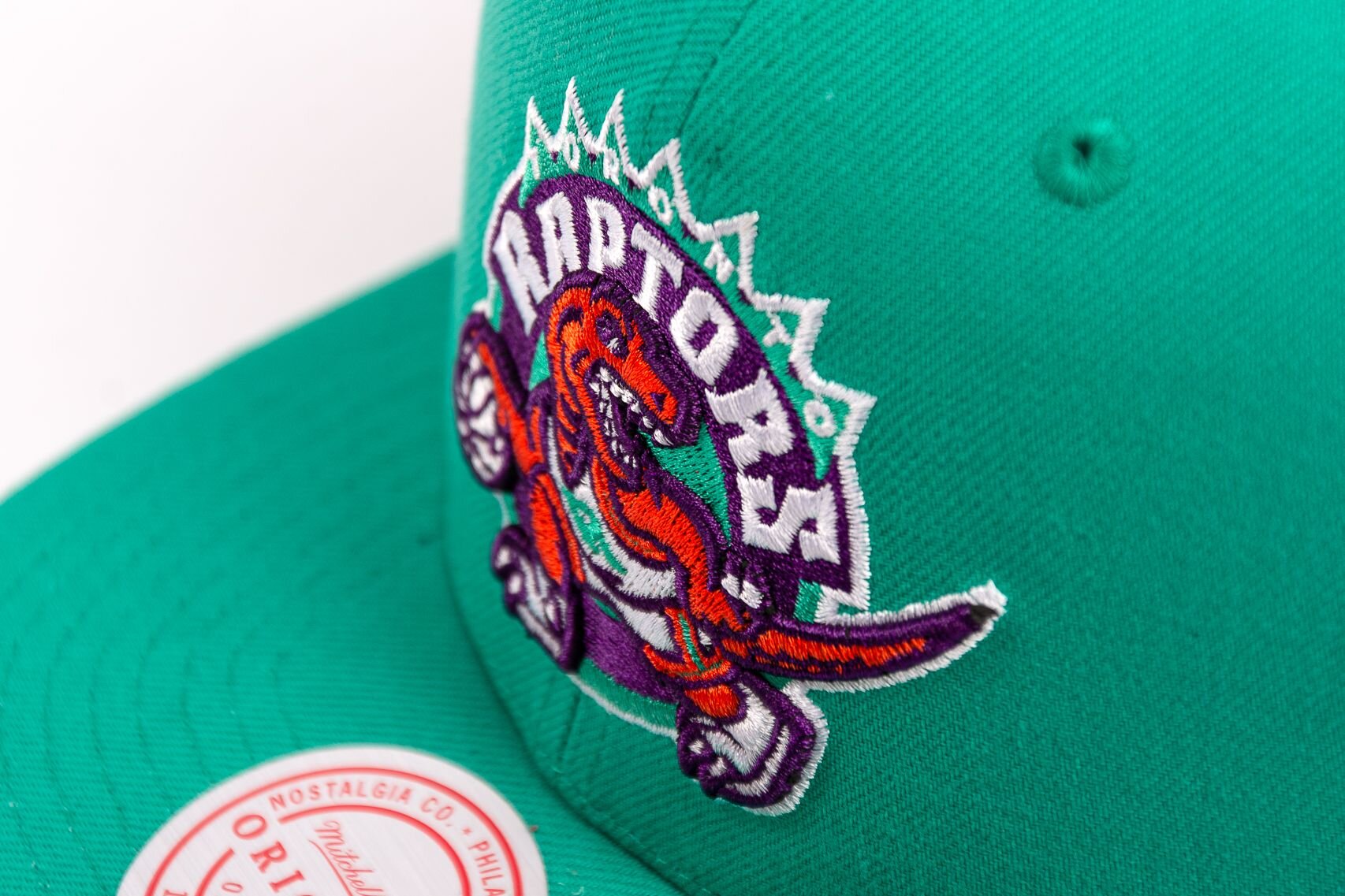 MENS MITCHELL & NESS NBA DESERT GREEN SNAPBACK HWC RAPTORS - TEAL