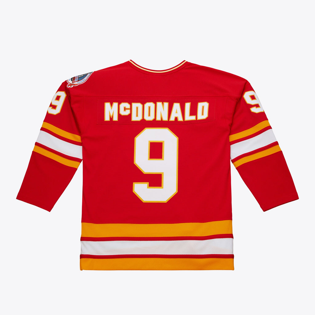 Mens Mitchell & Ness NHL DARK JERSEY FLAMES 1988 LANNY MCDONALD