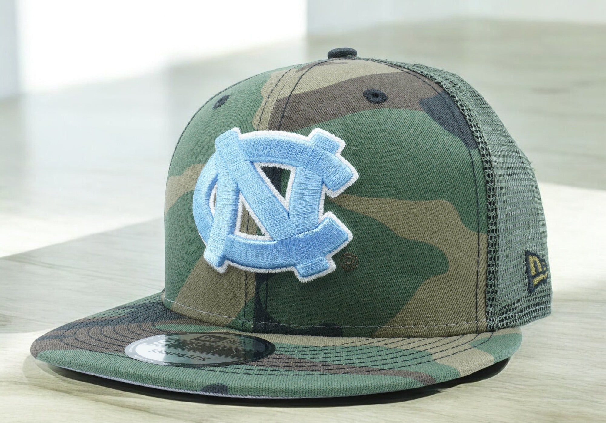 [60269847] MENS NEW ERA NCAA NORTH CAROLINA TAR HEELS 950 CAMO TRUCK D3 SNAPBACK