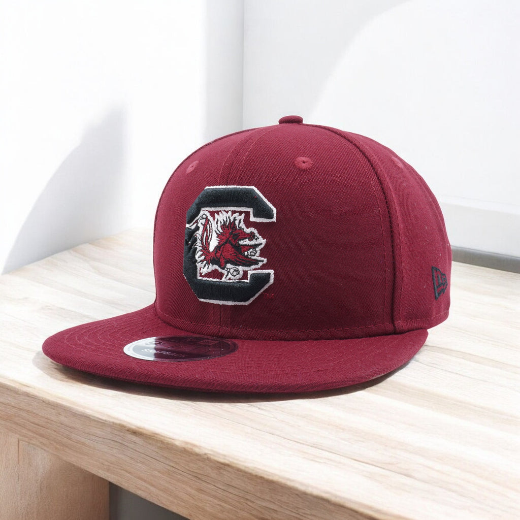 [70523720] MENS NEW ERA NCAA SOUTH CAROLINA GAMECOCKS 950 SNAPBACK - WINE