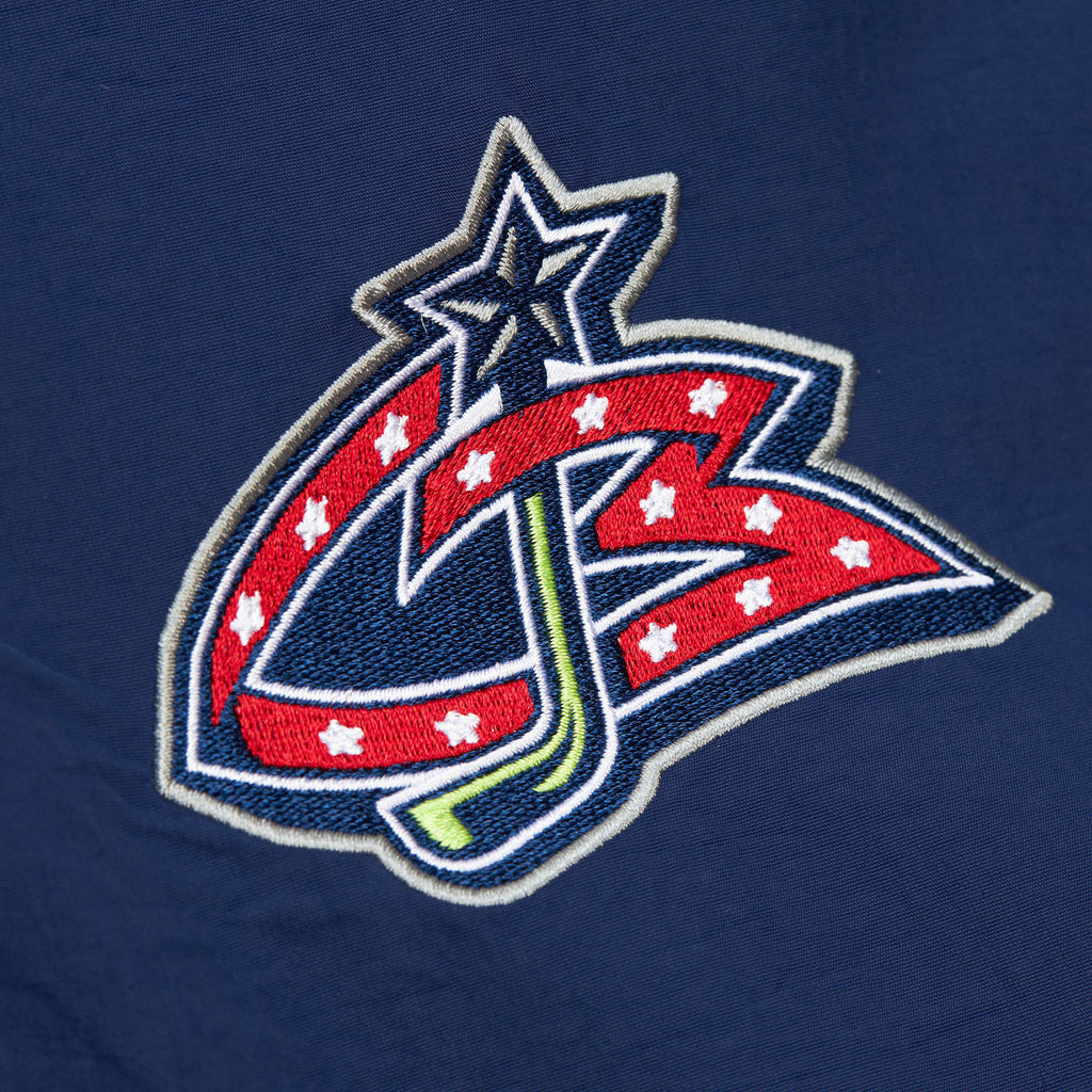 MENS MITCHELL & NESS NHL CLASSIC NYLON PULLOVER CURRENT LOGO BLUE JACKETS