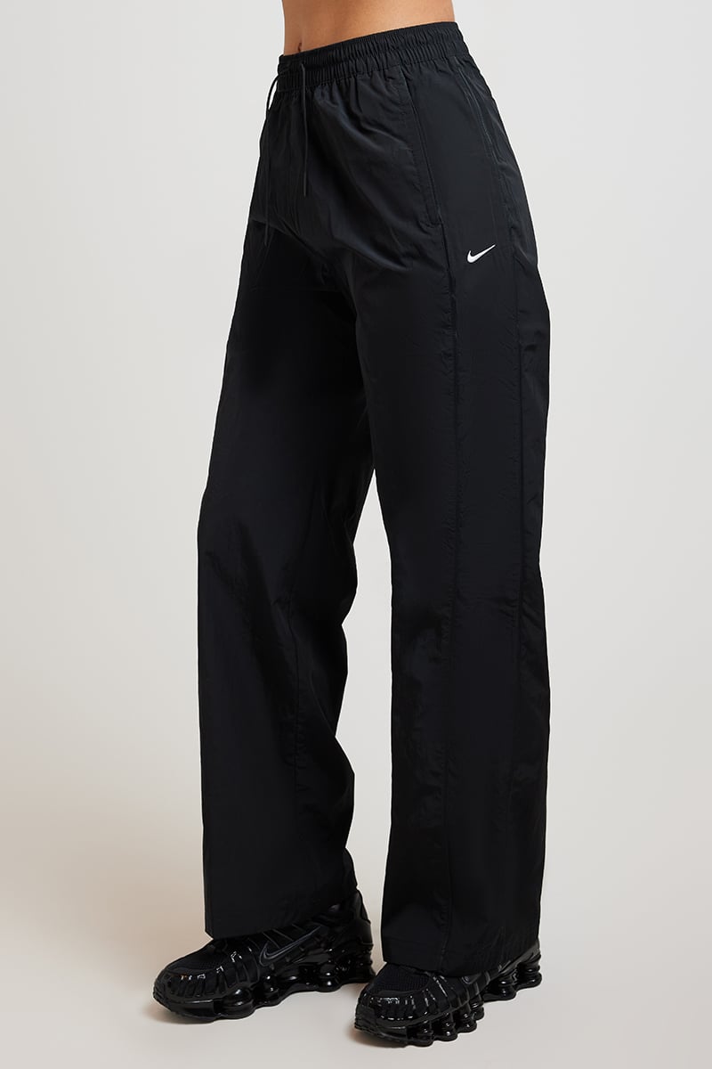 [FV7655-010] WOMENS NIKE WINDRUNNER HIGH-WAISTED WOVEN OPEN-HEM PANTS