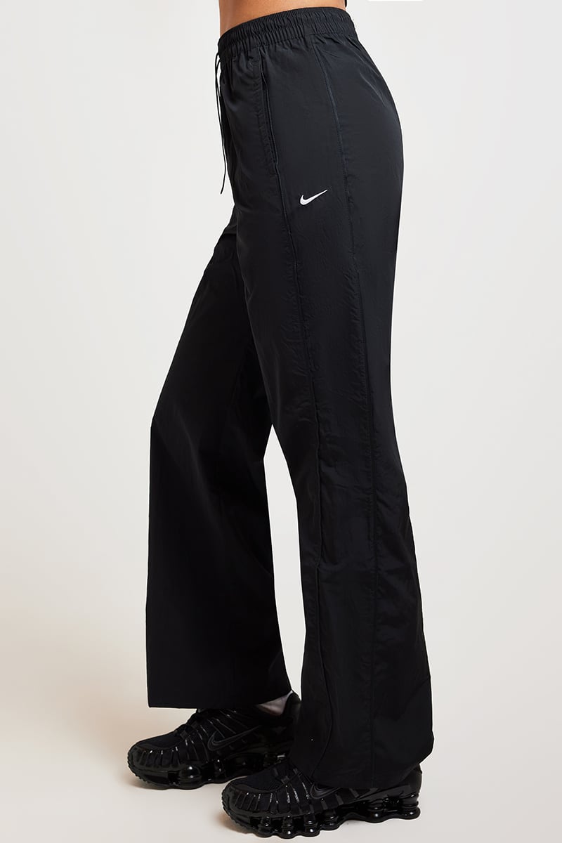 [FV7655-010] WOMENS NIKE WINDRUNNER HIGH-WAISTED WOVEN OPEN-HEM PANTS