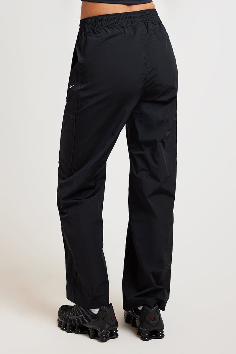 [FV7655-010] WOMENS NIKE WINDRUNNER HIGH-WAISTED WOVEN OPEN-HEM PANTS