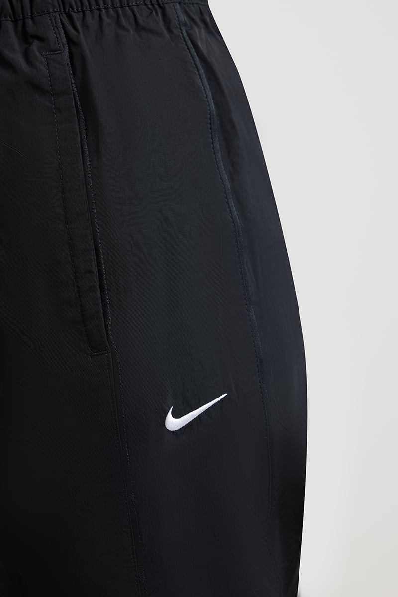 [FV7655-010] WOMENS NIKE WINDRUNNER HIGH-WAISTED WOVEN OPEN-HEM PANTS