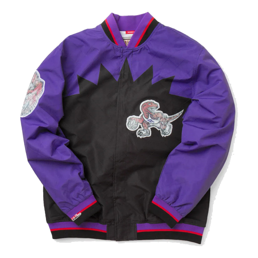 [OJBF1201-TRAYYPPPBLCK] MENS MITCHELL & NESS 75TH ANNI WARM UP JACKET RAPTORS