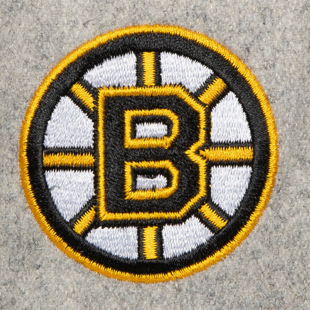 MENS MITCHELL & NESS NHL TAILSWEEP 2.0 MELTON SNAPBACK BRUINS