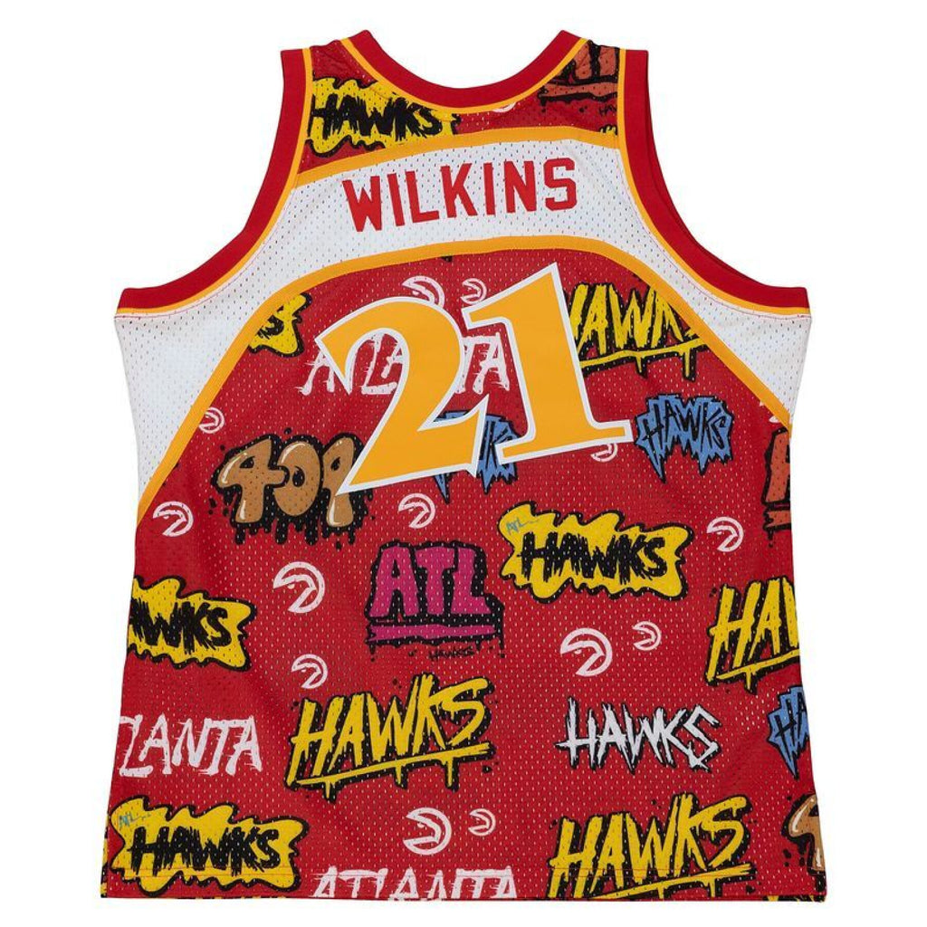MENS MITCHELL & NESS SLAP STICKER SWINGMAN JERSEY HAWKS 1986 DOMINIQUE WILKINS