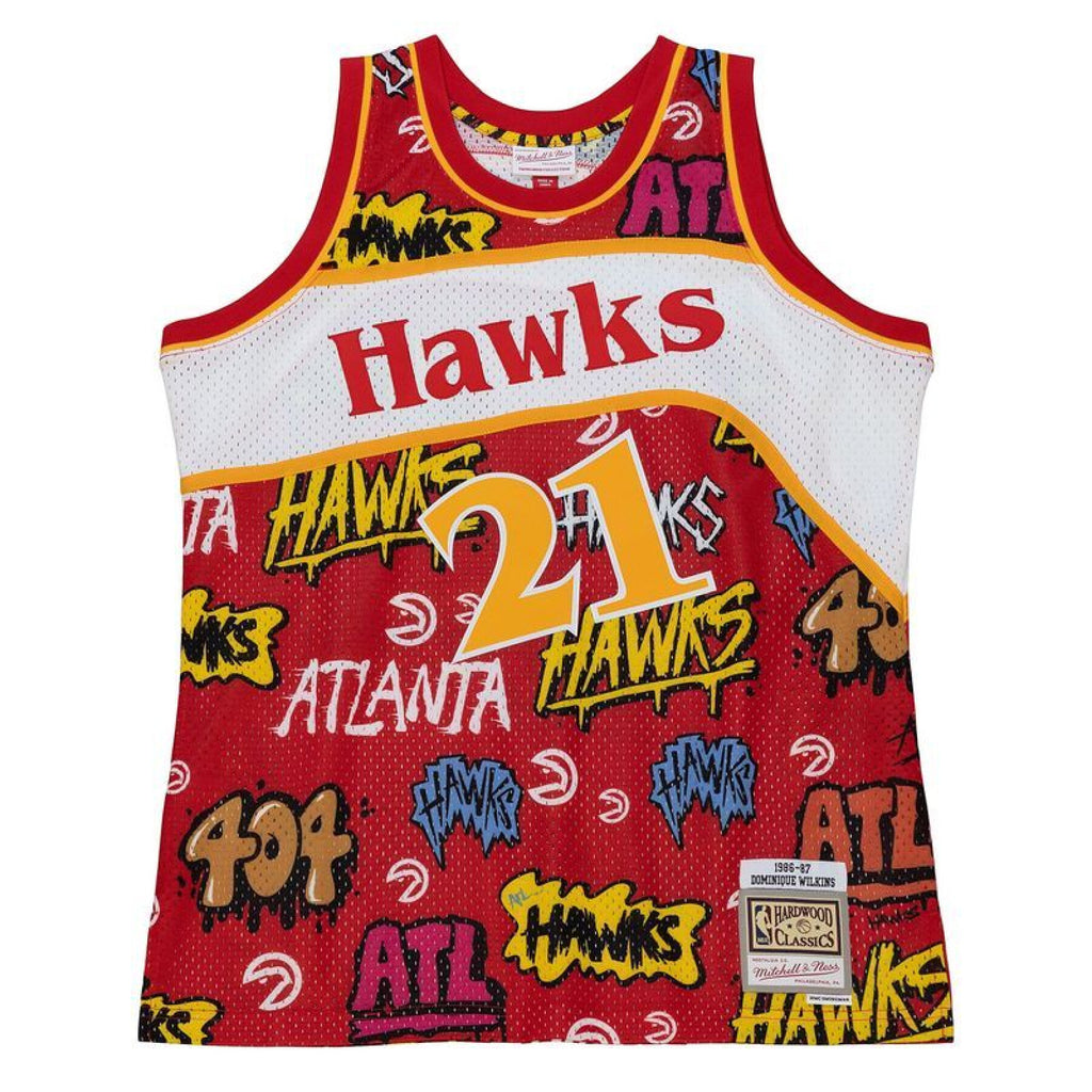 MENS MITCHELL & NESS SLAP STICKER SWINGMAN JERSEY HAWKS 1986 DOMINIQUE WILKINS