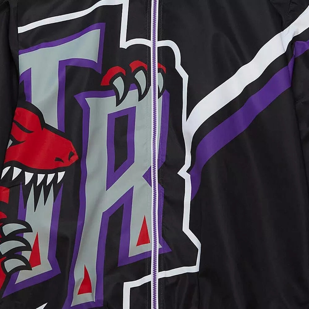 MENS MITCHELL & NESS EXPLODED LOGO WARM UP JACKET RAPTORS