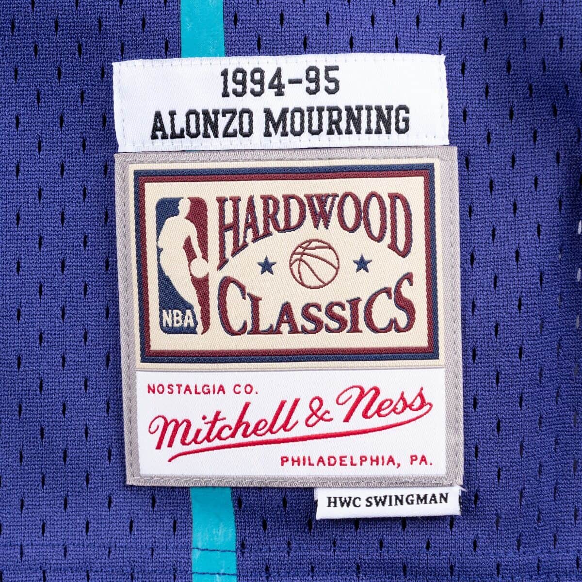 Mens Mitchell & Ness NBA SWINGMAN ALTERNATE JERSEY - HORNETS 94 ALONZO MOURNING